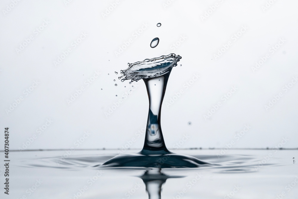 Freeze water liquid drop splash on pure background Freeze water liquid drop splash on pure background