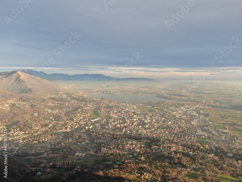 Aerial View of Erba, Lake Pusiano, and Surrounding Mountains near Como photo