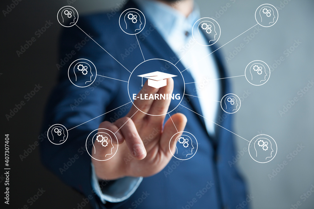 businessman pressing e-learning button businessman pressing e-learning button