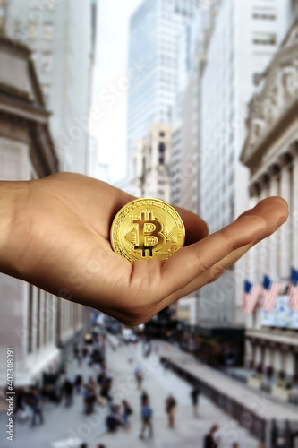 Cryptocurrency in hand. Bitcoin in hand. Submit cryptocurrency. Digital currency. Digital money. 