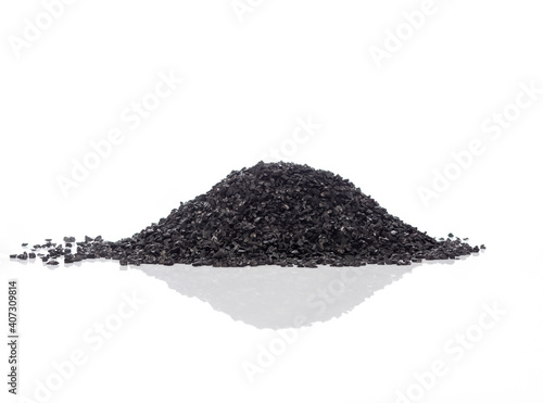 Graphite powder is generally used as lubricant. Isolated on white.