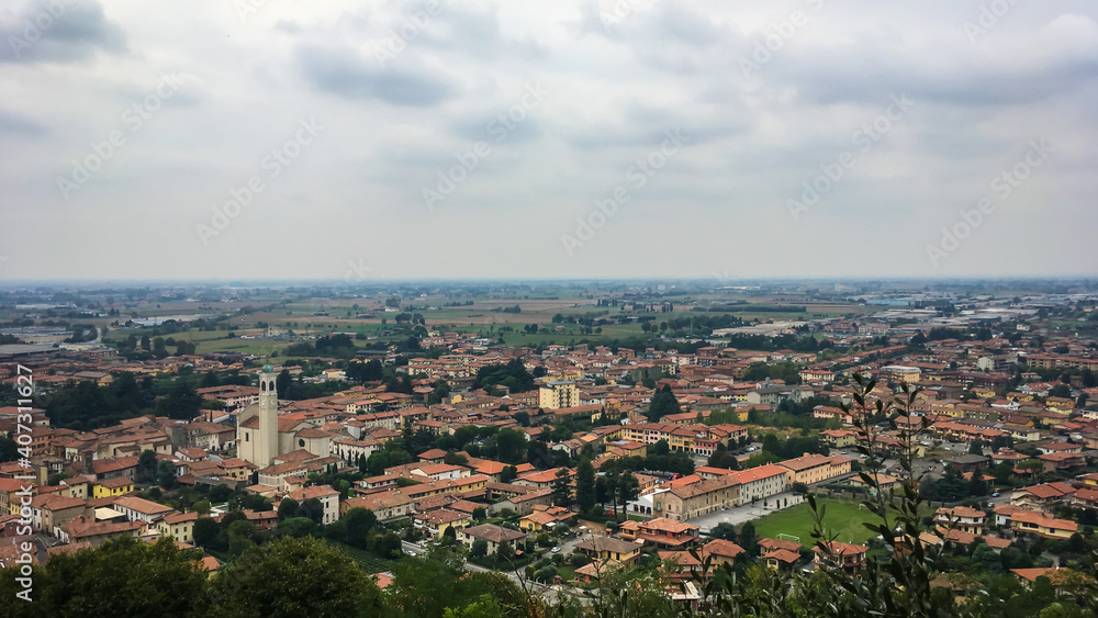 Cityscape of little Italian town of Coccaglio with the view of the Church of Santa Maria Nascente, Franciacorta region, in the province of Brescia, Lombardy, Italy