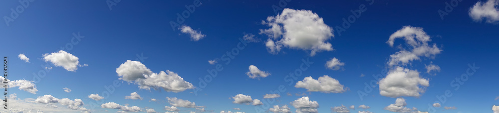 Fototapeta premium Panorama. Beautiful blue sky and white clouds.