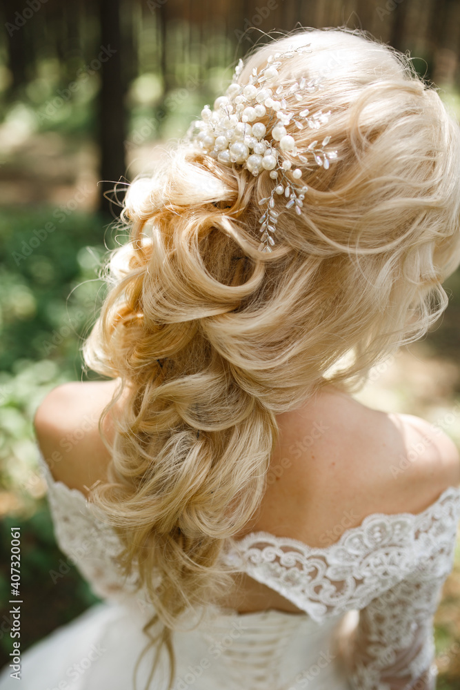 Bride's hairstyle back view. Bride in nature, back view. Bride's hairstyle back view. Bride in nature, back view.