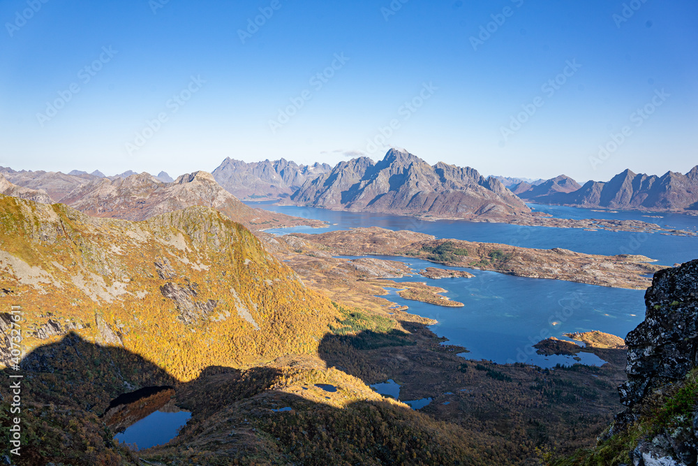 Fototapeta premium View from the Fløya mountain over mountains and the sea