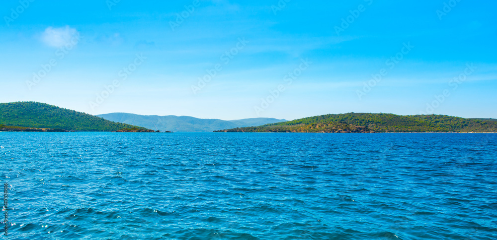 Beautiful Mediterranean landscape with Aegean sea and green hills