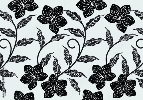 Indonesian batik motifs with very distinctive plant patterns photo