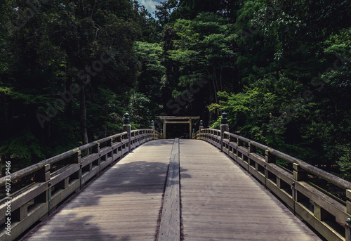 Ise Grand Shrine (Ise Jingu Shrine) Bridge in Mie, Japan. Shinto bridge in a dark forest. Bridge to heaven with torii gate