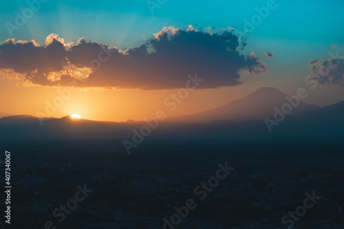 Sunset behind Mt Fuji in Yokohama Japan with Tokyo city below.