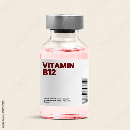 Vitamin B12 injection in a glass bottle with pink liquid photo