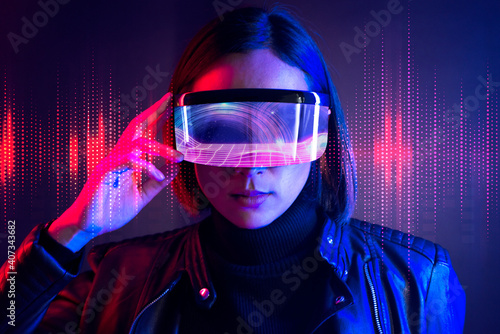 Woman with smart glasses futuristic technology photo