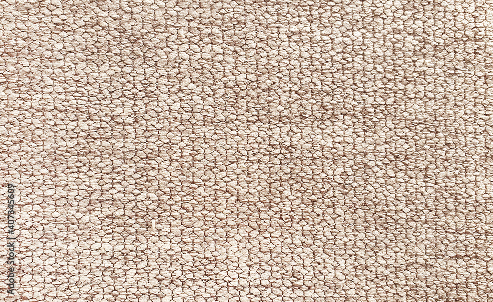 Fototapeta premium close up of beige plain yarn fabric sample for interior drapery or upholstery work. canvas background.