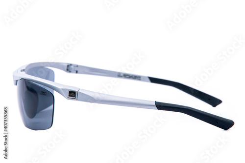 Fashion sunglasses grey frames on white background. photo