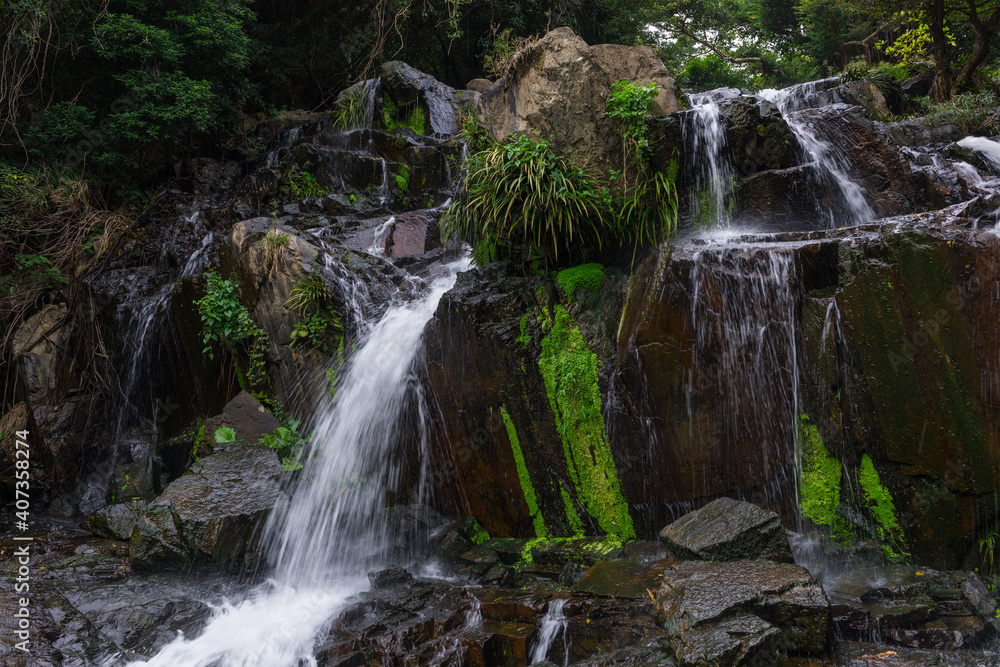 Fototapeta premium Cascade waterfall river in tropical forest