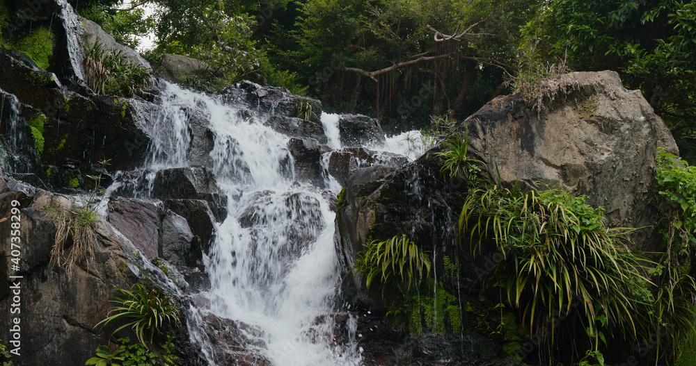 Fototapeta premium Cascade waterfall river in tropical forest