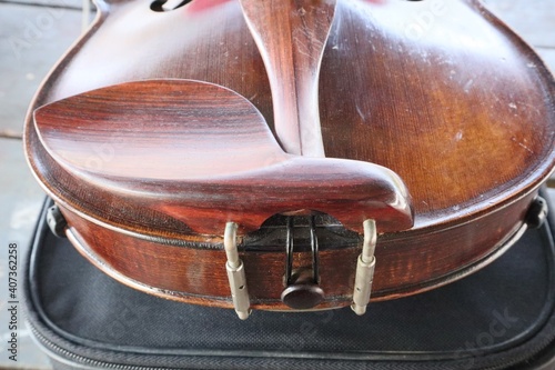 Close up of old brown wooden violin Musical instrument repair ideas © วอน จังมึง