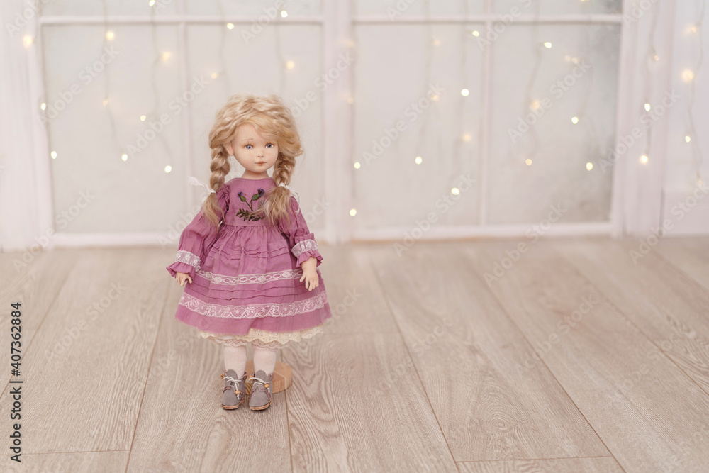 designer interior doll with human face made by hand from textiles in retro style designer interior doll with human face made by hand from textiles in retro style