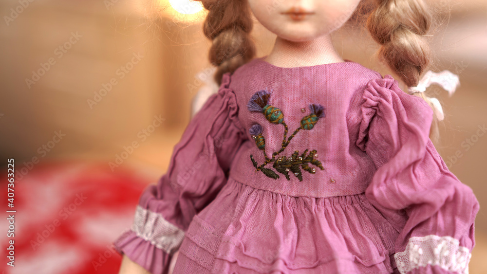 designer interior doll with human face made by hand from textiles in retro style designer interior doll with human face made by hand from textiles in retro style