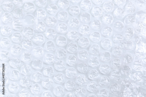 Packaging material  background pattern with transparent white bubble wrap surface texture  household goods manufacturing industry  cargo safety wrap