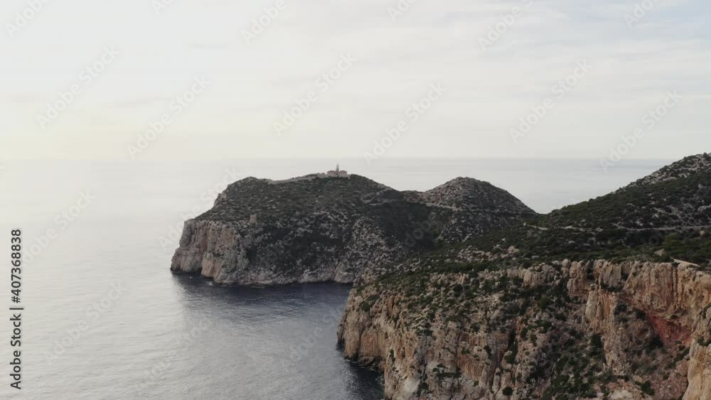 Seascape with rocky shore dron 4K video. Aerial view of a rock on which the waves of the Mediterranean Sea crash. Beautiful background landscape video Seascape with rocky shore dron 4K video. Aerial view of a rock on which the waves of the Mediterranean Sea crash. Beautiful background landscape video