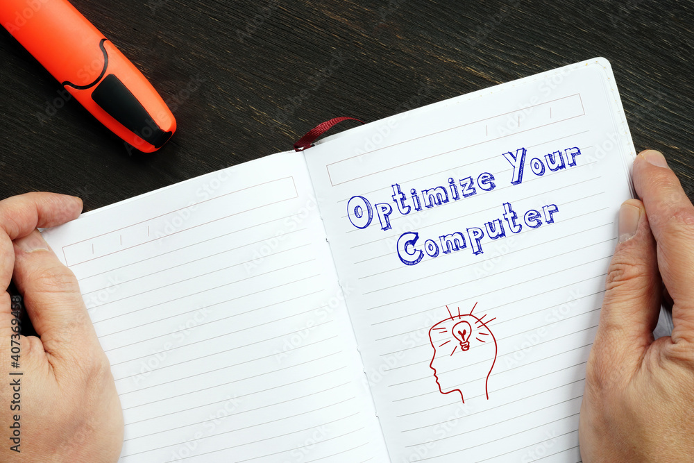 Motivational concept about Optimize Your Computer with phrase on the page. Motivational concept about Optimize Your Computer with phrase on the page.