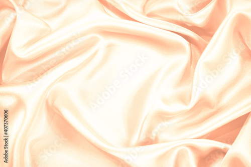 Pink cream light peach background. Soft wavy folds in the fabric. Tender. Wedding, Valentine concept. Or baby, newborn greeting card. Delicate beautiful background with copy space for design.