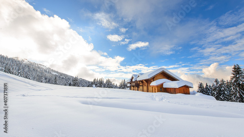 Alpine hut in the midst of lots of snow on the Italian Alps