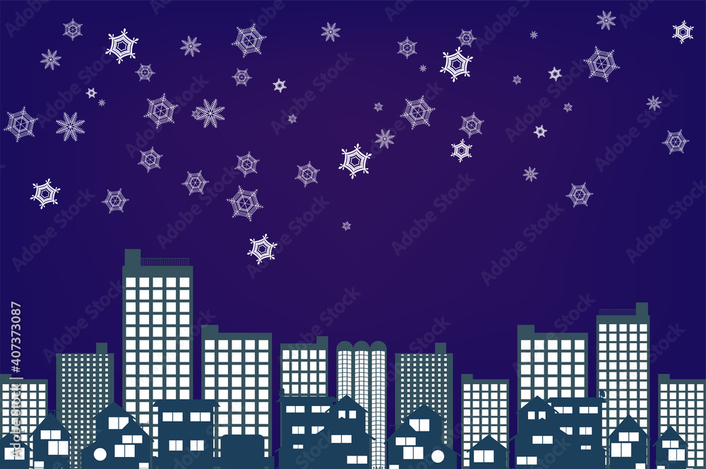 雪の結晶と都会の街並み背景