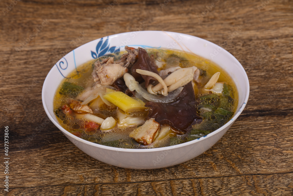 Thai style soup with meat and mushrooms Thai style soup with meat and mushrooms