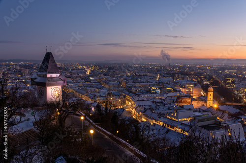 Graz, Austria - January 11, 2021: View on the old town during sunset in the winter