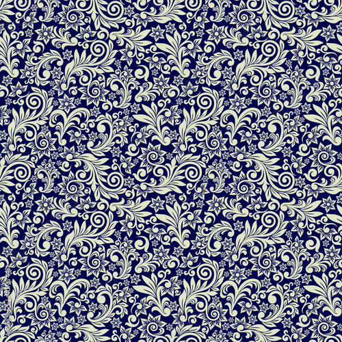 Seamless blue background with beige pattern in baroque style. Vector retro illustration. Ideal for printing on fabric or paper for wallpapers, textile, wrapping.