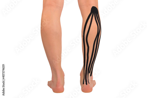 fixing leg muscles with medical tape, isolated on white, back view