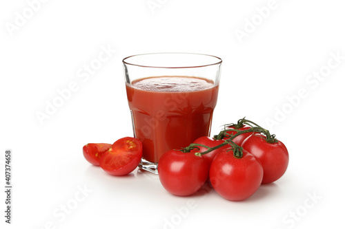 Glass of tomato juice and tomatoes isolated on white background