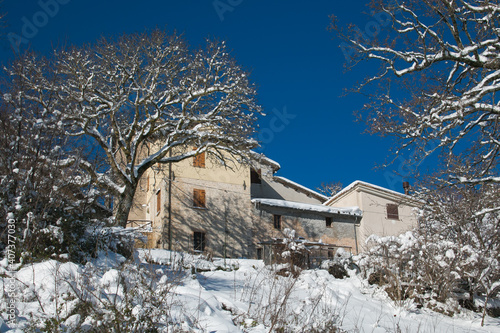 View of mountain village during winter day in Umbria photo