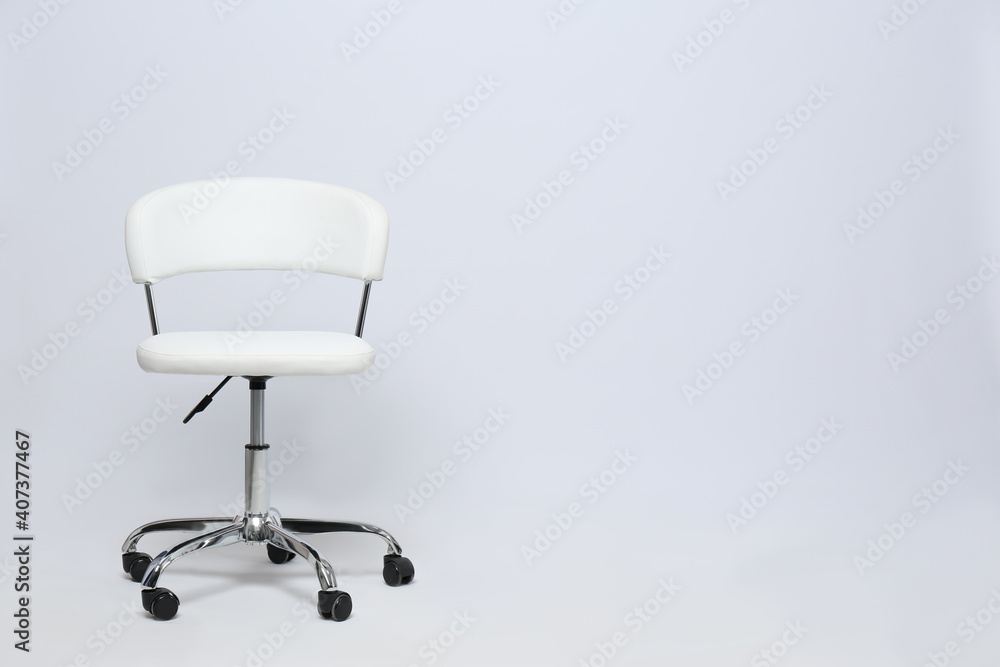 Comfortable office chair on white background, space for text Comfortable office chair on white background, space for text