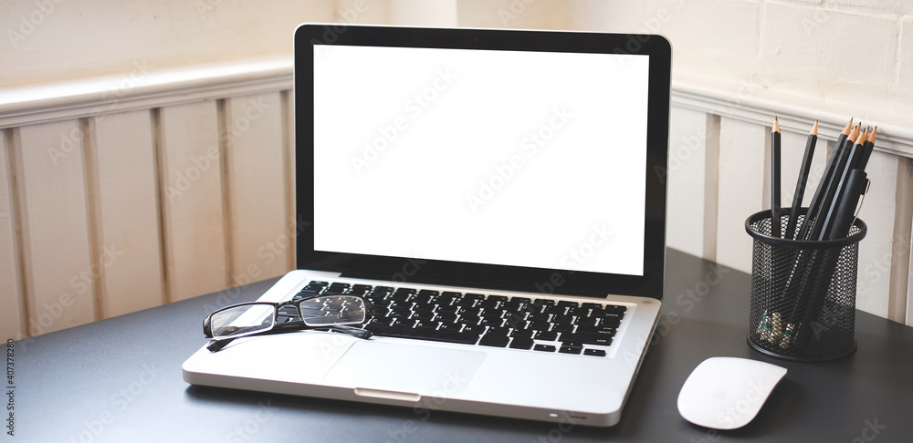 Modern workspace with computer with blank screen and equipment on white table.Blank screen for your information. Modern workspace with computer with blank screen and equipment on white table.Blank screen for your information.