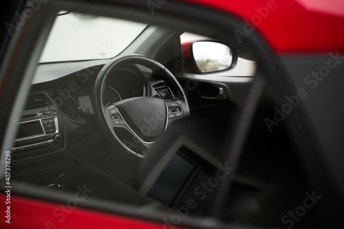 Interior view of car with black interior through the glass. © Artem Zakharov