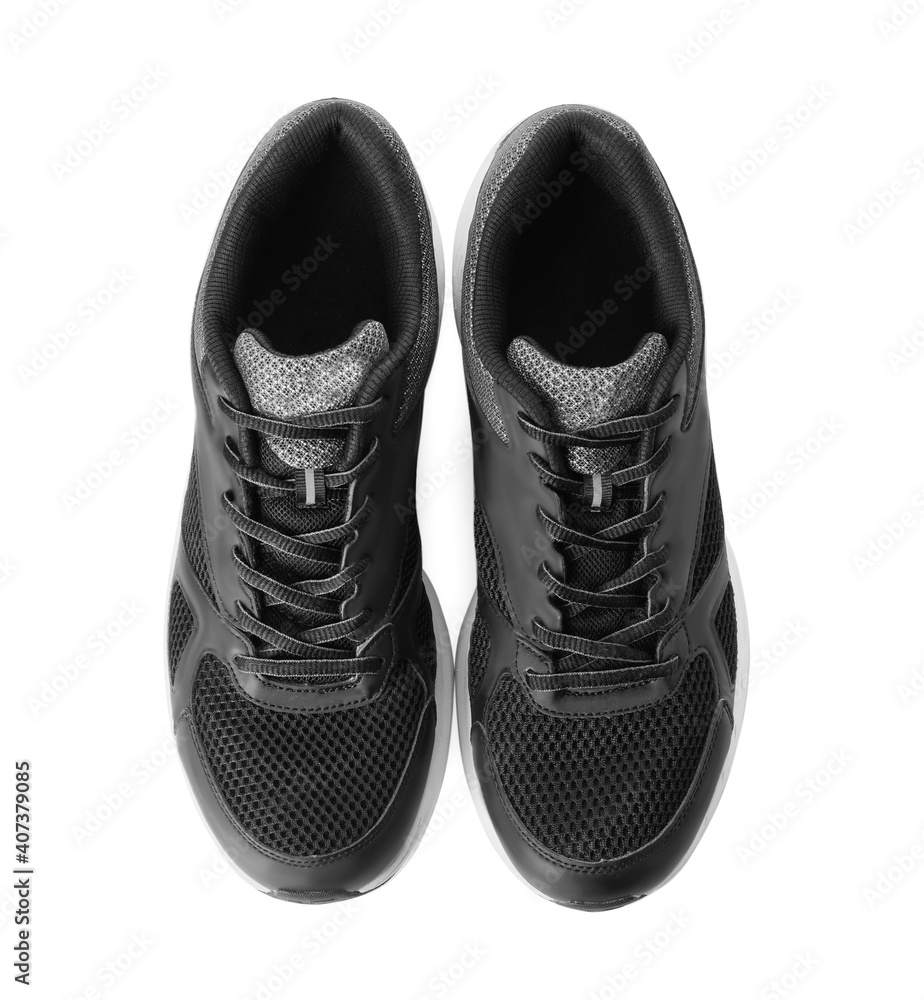 Stylish sport shoes on white background, top view. Trendy footwear