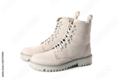 Pair of stylish boots on white background