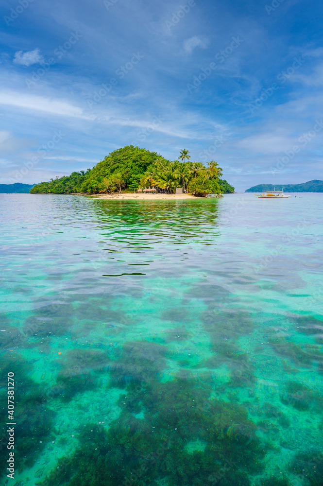 Inaladelan Island (also known as German Island) in Port Barton Bay with paradise white sand beaches - Tropical travel destination in Palawan, Philippines