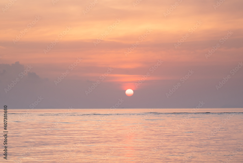 Beautiful  tropical  golden sea  sunset and yellow sky  background
