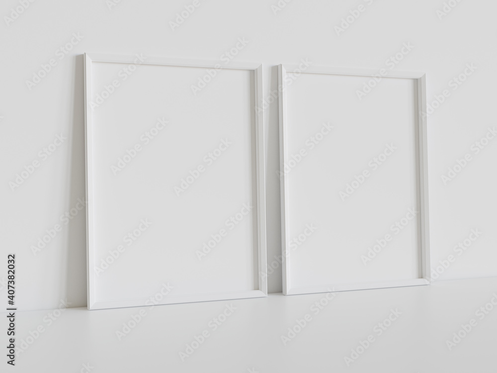 Two white frames leaning on white floor in interior mockup. Template of pictures framed on a wall 3D rendering Two white frames leaning on white floor in interior mockup. Template of pictures framed on a wall 3D rendering