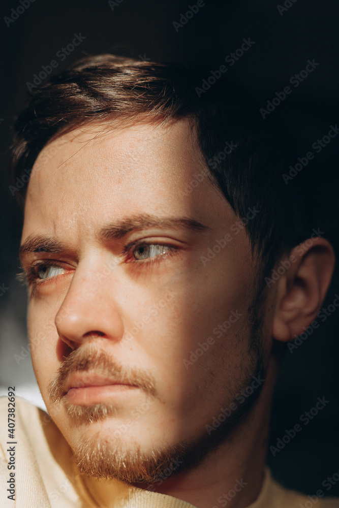 close up portrait of a sad man close up portrait of a sad man