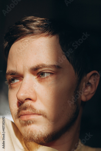 close up portrait of a sad man