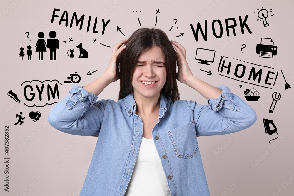 Fototapeta premium Stressed young woman, text and drawings on grey background