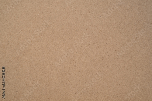 Blank background from clean light craft paper (cardboard, parchment) of rectangular size and horizontal orientation.