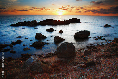 Beautiful sunset on tropical beach with rocks at Chanthaburi province  Thailand