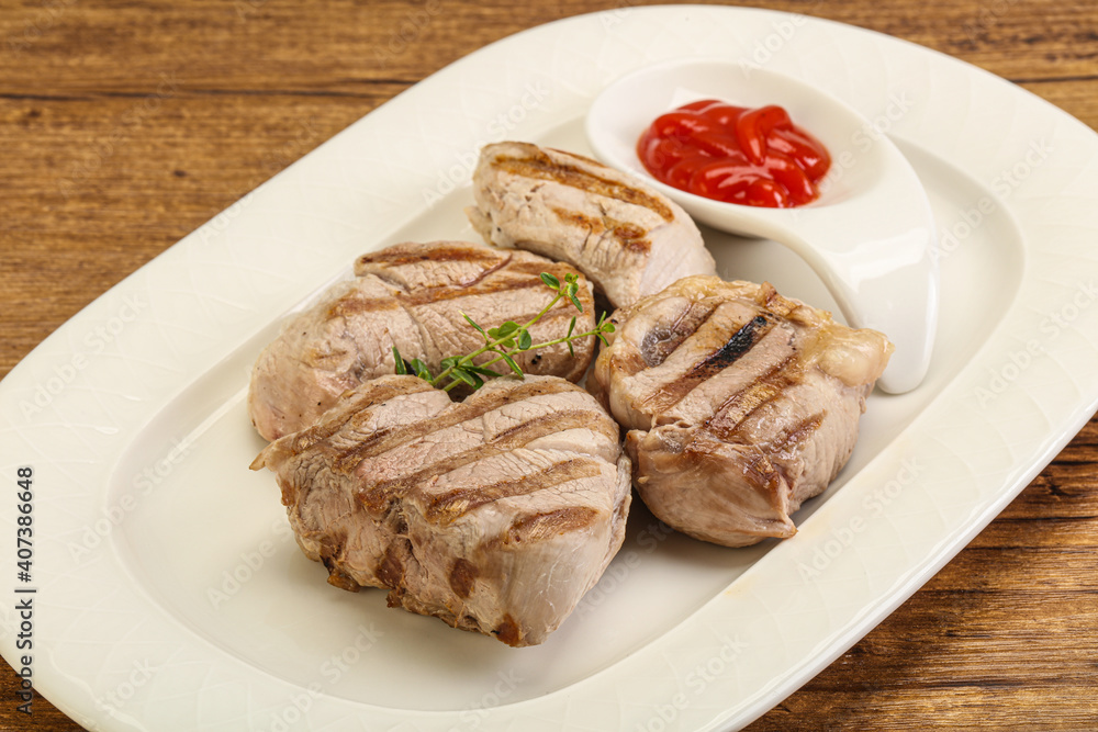 Grilled pork tenderlion with tomato sauce