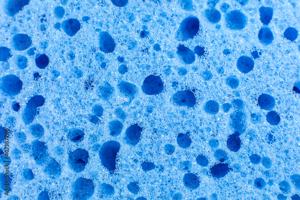 Blue sponge texture background. Close up, macro photo. Blue sponge texture background. Close up, macro photo.