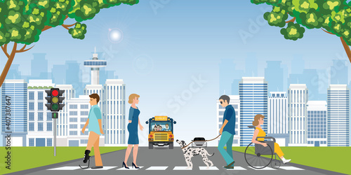 Disabled people crossing a crosswalk.